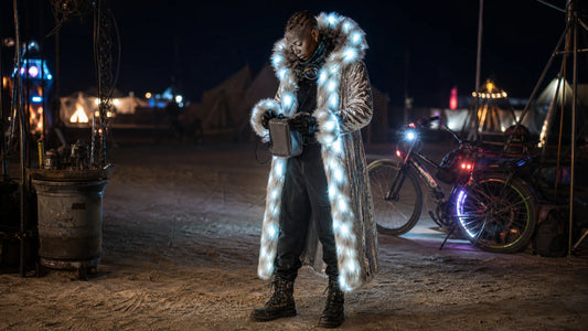 LED Festival Coats: How to Shine Safely After Dark — practical festival fashion editorial